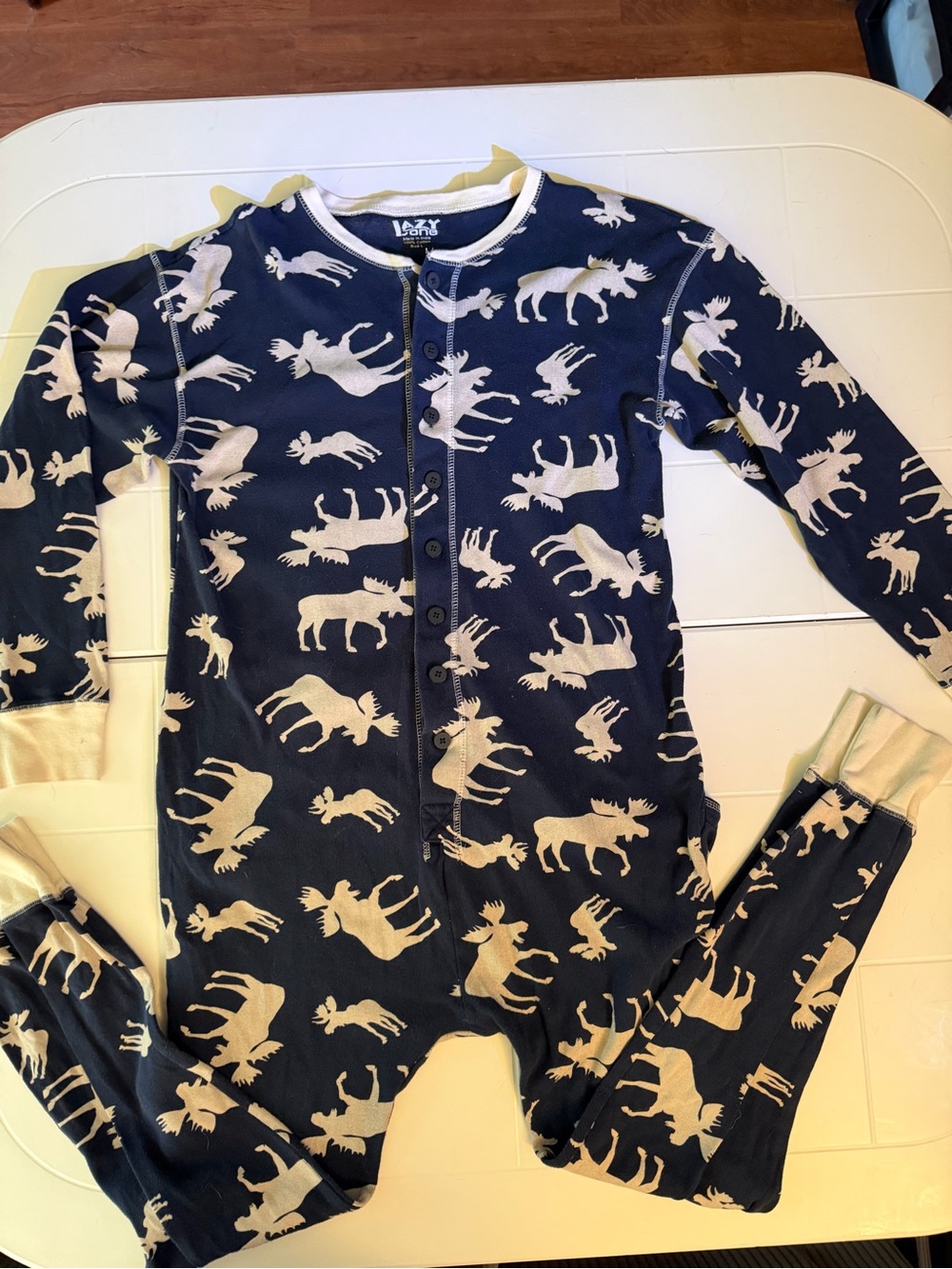 Adult Lazy One Pajamas in navy and cream with a moose print.